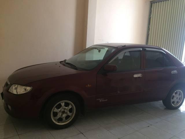 Bán ô tô Mazda 323 đời 2004, màu đỏ xe gia đình, giá chỉ 175 triệu