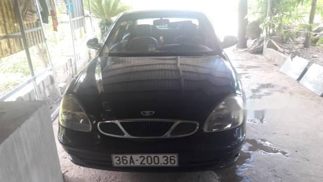 Bán Daewoo Nubira đời 2003, màu đen, xe đẹp