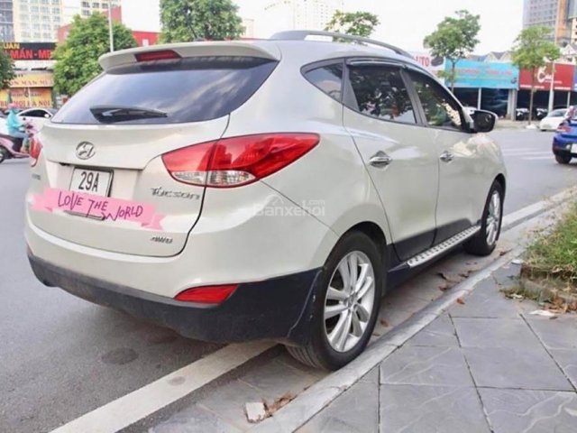 Cần bán xe Hyundai Tucson 2.0 AT 4WD năm 2013, màu vàng, nhập khẩu 