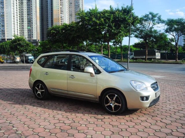 Cần bán Kia Carens 2.0 sx 2009, màu vàng