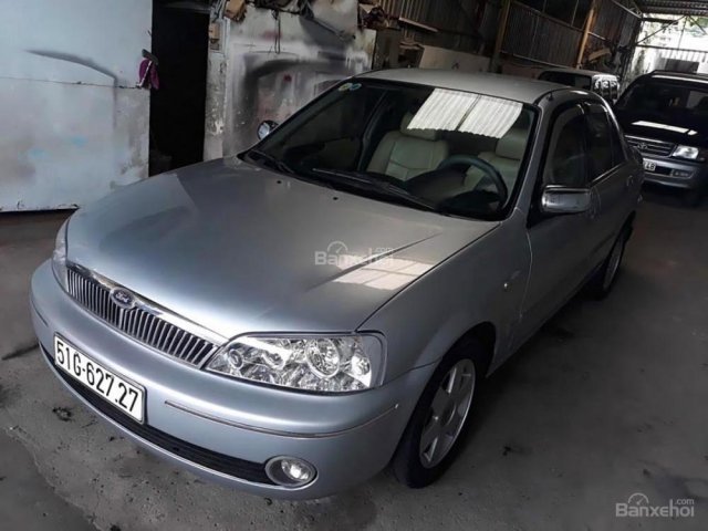 Cần bán lại xe Ford Laser GHIA 1.8 MT sản xuất năm 2002, màu bạc xe gia đình