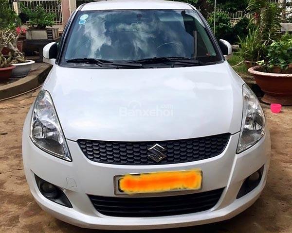 Bán Suzuki Swift 1.4 AT đời 2014, màu trắng số tự động, 430tr