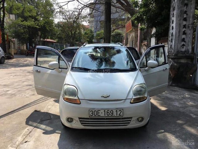 Cần bán Chevrolet Spark LT 0.8 MT đời 2009, màu trắng, xe đẹp chính chủ