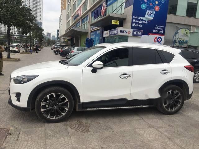 Cần bán lại xe Mazda CX 5 2.0 đời 2017, màu trắng ít sử dụng  