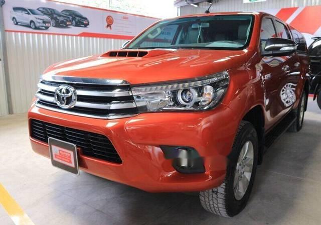 Cần bán lại xe Toyota Hilux sản xuất năm 2016, màu đỏ  