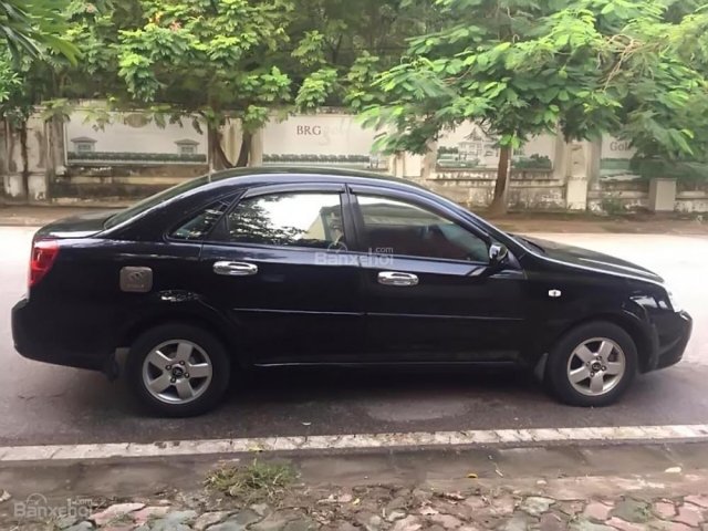 Bán Daewoo Lacetti EX sản xuất 2009, màu đen còn mới, giá chỉ 230 triệu