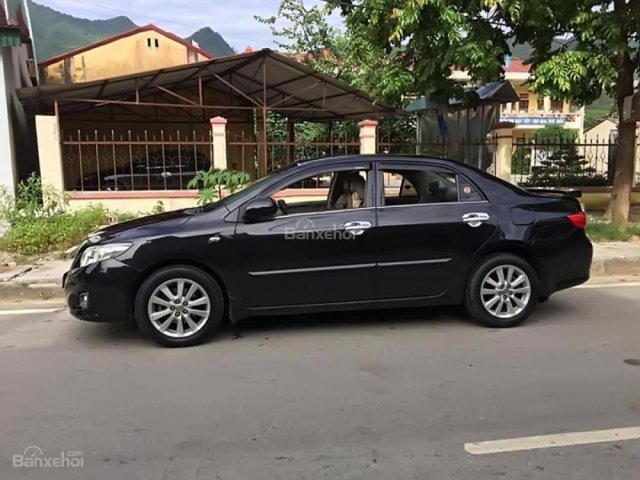 Bán Toyota Corolla GLi 1.8 AT 2007, màu đen, nhập khẩu Nhật Bản  0