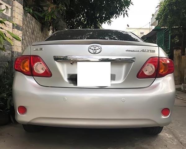 Bán Toyota Corolla Altis đời 2010, màu bạc