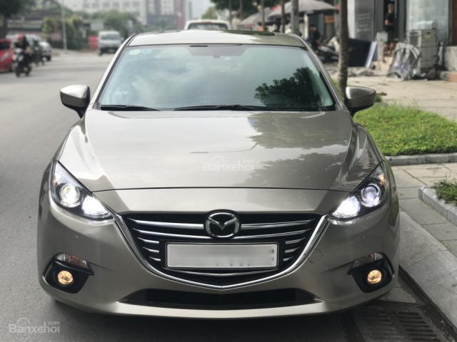 Bán Mazda 3 năm 2016 màu vàng cát, giá 605 triệu