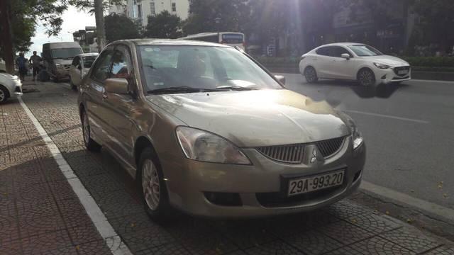 Bán xe Mitsubishi Lancer năm sản xuất 2004, màu vàng, 230tr