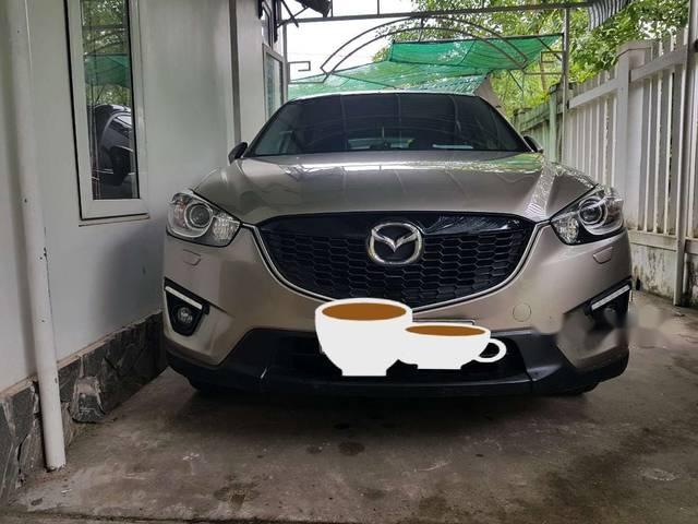 Cần bán xe Mazda CX 5 năm 2015, màu vàng như mới, 740 triệu