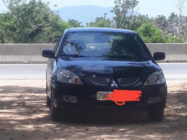 Bán ô tô Mitsubishi Lancer G năm 2004, màu đen, xe nhập