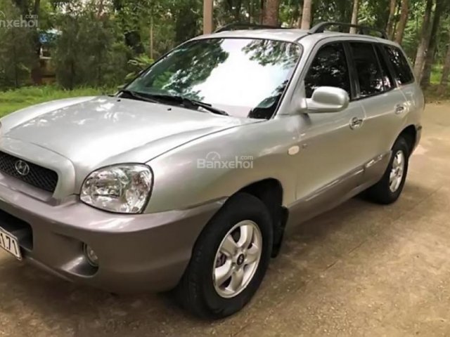 Bán Hyundai Santa Fe 2.0AT màu bạc, đời 2005, xe đang hoạt động tốt