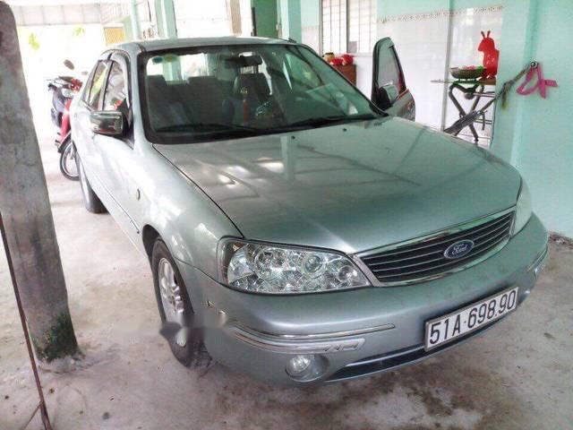 Cần bán gấp Ford Laser năm sản xuất 2004, màu bạc