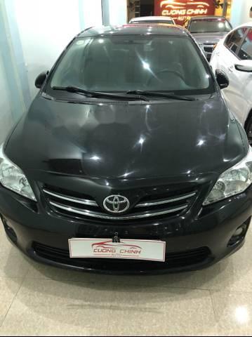 Bán Toyota Corolla altis MT 2011, màu đen chính chủ, giá 490tr