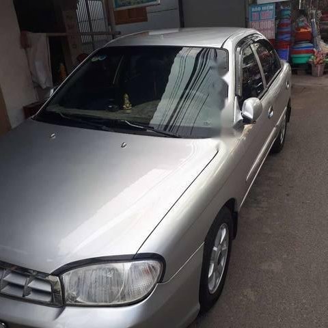 Bán xe Kia Spectra đời 2004, màu bạc, giá 125tr