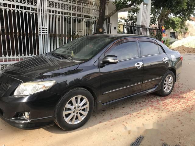 Cần bán xe Toyota Corolla Altis đời 2010, màu đen 