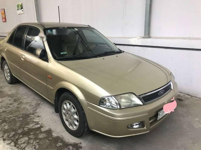 Cần bán gấp Ford Laser sản xuất 2002, màu vàng còn mới