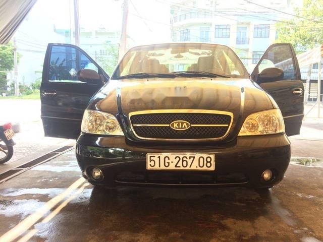 Cần bán gấp Kia Carnival năm sản xuất 2009, màu đen 