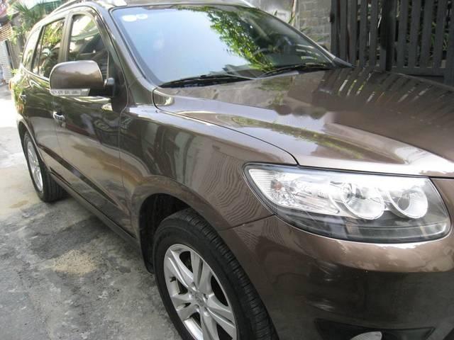 Cần bán Hyundai Santa Fe 2012 tự động, máy dầu, nâu vàng cực đẹp