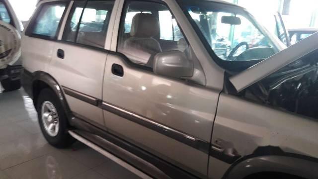 Cần bán xe Ssangyong Musso sản xuất 2004, màu ghi vàng 