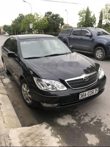 Cần bán lại xe Toyota Camry 2.4G đời 2005, màu đen, giá tốt