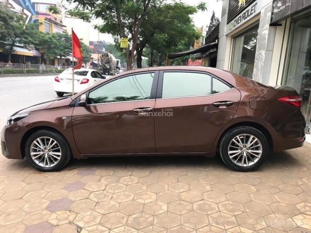 Bán xe Toyota Corolla altis 1.8G AT đời 2015, màu nâu chính chủ, giá tốt