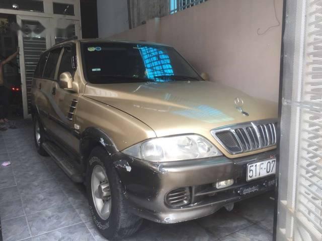 Cần bán xe Ssangyong Musso đời 2003, màu vàng, nhập khẩu nguyên chiếc xe gia đình, 200tr