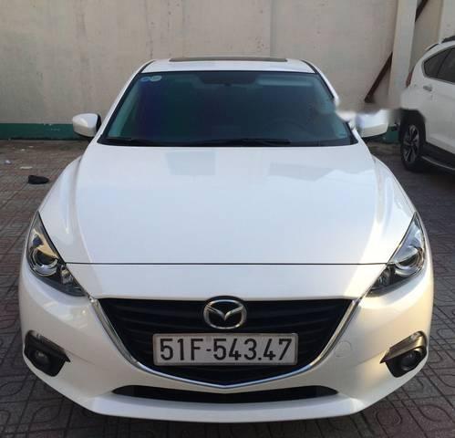 Cần bán gấp Mazda 3 sản xuất 2015, màu trắng ít sử dụng, 600 triệu