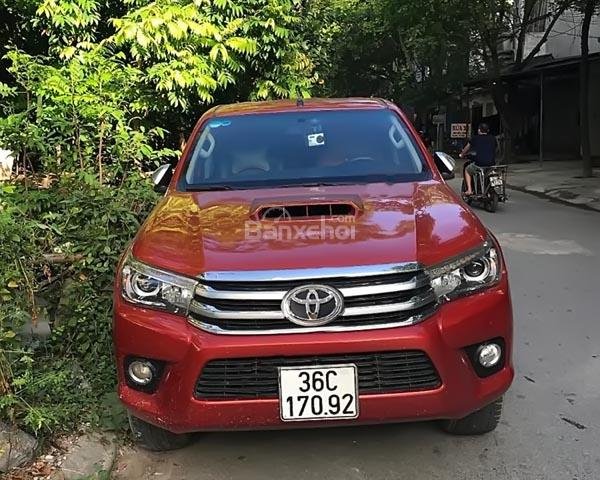 Bán ô tô Toyota Hilux 3.0G 4x4 AT sản xuất 2016, màu đỏ, xe nhập