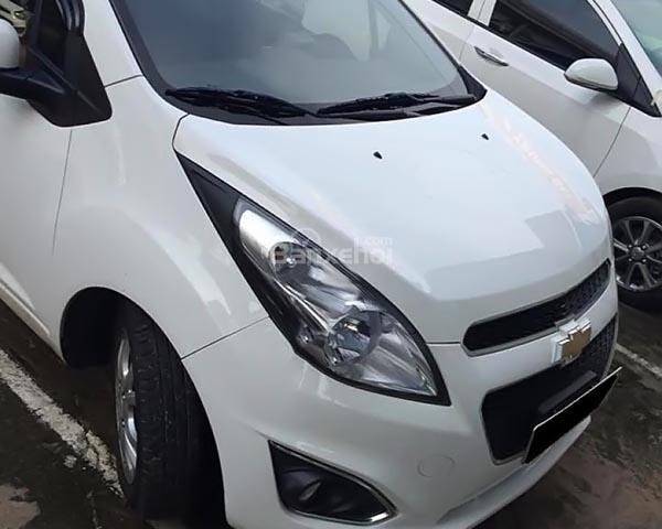 Bán xe Chevrolet Spark LTZ 2015 màu trắng, xe nữ ít chạy cực đẹp, lăn bánh 25 ngàn km