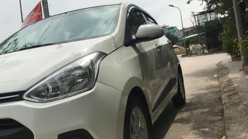 Bán Hyundai Grand i10 1.2 AT đời 2016, màu trắng  