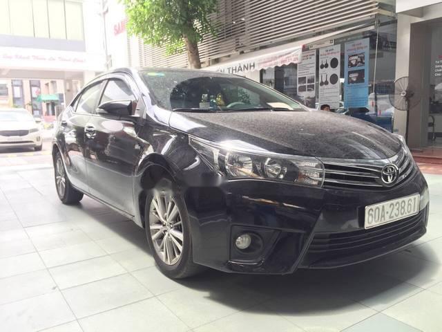 Cần bán Toyota Corolla Altis 1.8 AT 2015, odo 72.000km, màu đen, đủ đồ chơi
