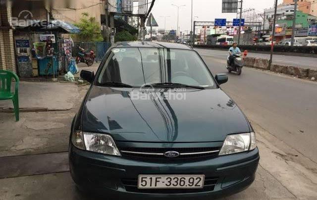 Cần bán gấp Ford Laser Lx đời 2011, màu xanh lam