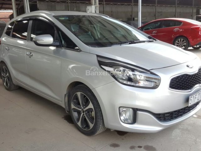 Bán Kia Rondo GAT 2.0AT màu bạc, số tự động, sản xuất 2015, biển Sài Gòn, lăn bánh 56000km