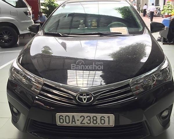 Cần bán xe Toyota Corolla 1.8G đời 2015, màu đen như mới  