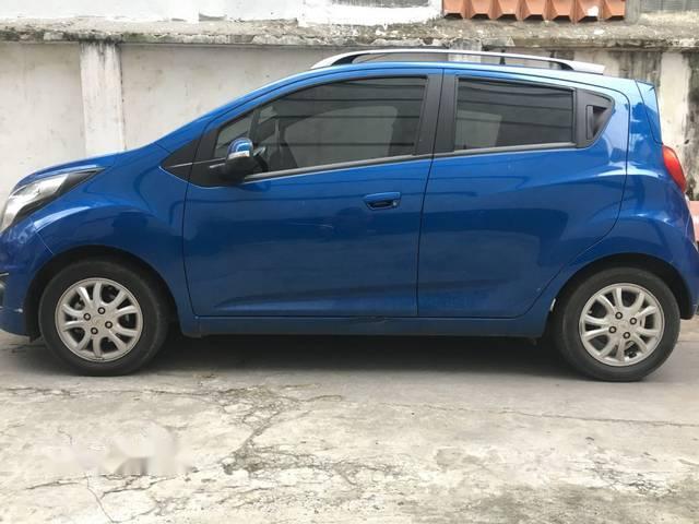 Cần bán xe Chevrolet Spark LTZ sản xuất năm 2014, màu xanh lam như mới