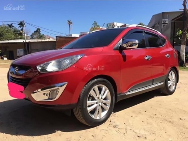 Cần bán Hyundai Tucson 2.0 AT 4WD đời 2010, màu đỏ, nhập khẩu nguyên chiếc  