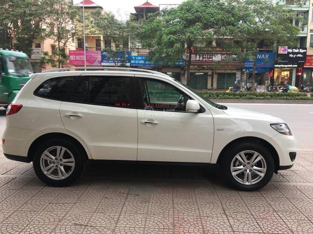 Gia đình muốn bán Hyundai Santafe màu trắng 2012, AT, dầu, full option. Xe gia đình đập thùng mới