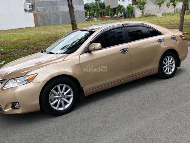 Bán Toyota Camry 2.5LE sản xuất năm 2009, màu vàng, nhập khẩu 