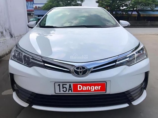 Bán xe Toyota Corolla altis 1.8E AT đời 2017, màu trắng còn mới