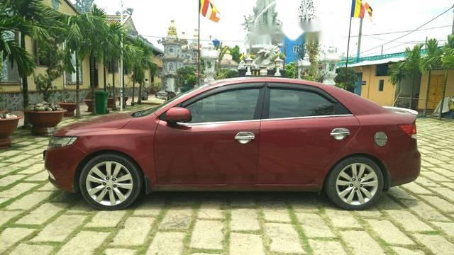 Cần bán lại xe Kia Forte AT đời 2011, màu đỏ, xe nhà đi nên giữ rất kĩ