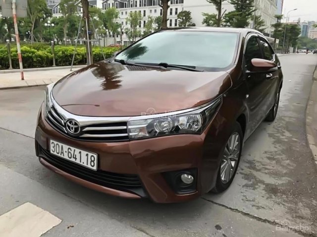 Cần bán lại xe Toyota Corolla Altis 1.8G AT sản xuất năm 2015, màu nâu chính chủ, giá 689tr