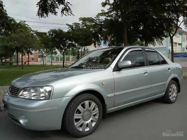 Bán Ford Laser GHIA 1.8 AT sản xuất năm 2004, màu bạc xe gia đình