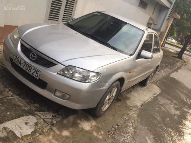 Bán xe Mazda 323 năm sản xuất 2002, màu bạc chính chủ