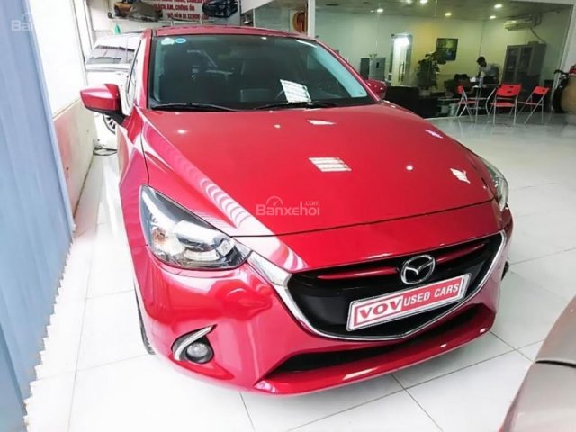 Bán Mazda 2 Hatchback 2016 màu đỏ, chất xe như mới, 1 chủ sử dụng từ đầu