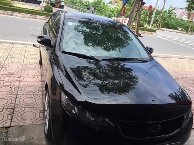 Bán xe Kia Cerato 1.6 AT sản xuất năm 2010, màu đen, nhập khẩu 