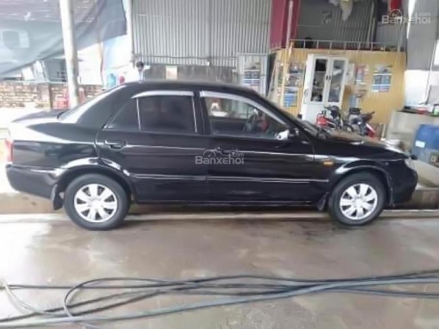 Cần bán Mazda 323 đời 2002, màu đen chính chủ