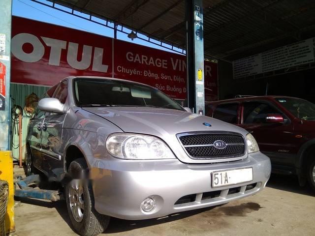 Bán xe Kia Carnival GS sản xuất 2007 số sàn, màu hồng phấn