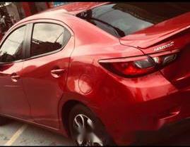 Bán ô tô Mazda 2 năm sản xuất 2016, màu đỏ